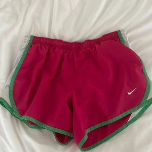 pink and green nike running shorts